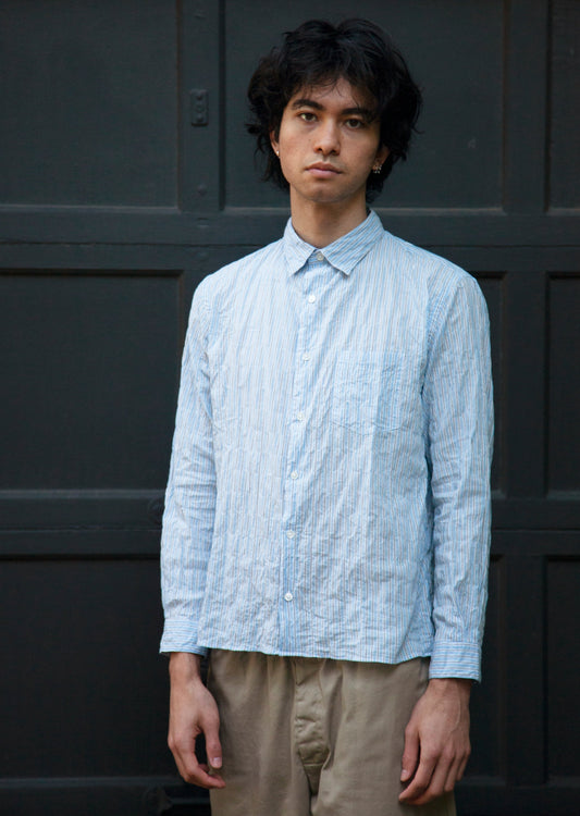  notch shirt in color light blue stripe on model  front