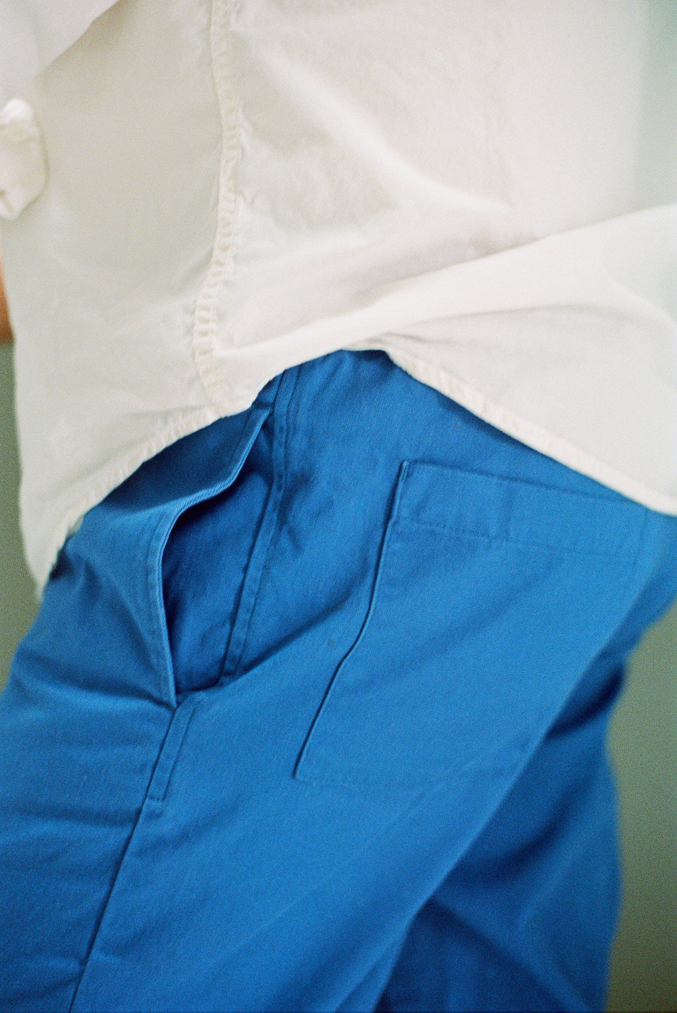 side close up of gathered pants in color marine blue