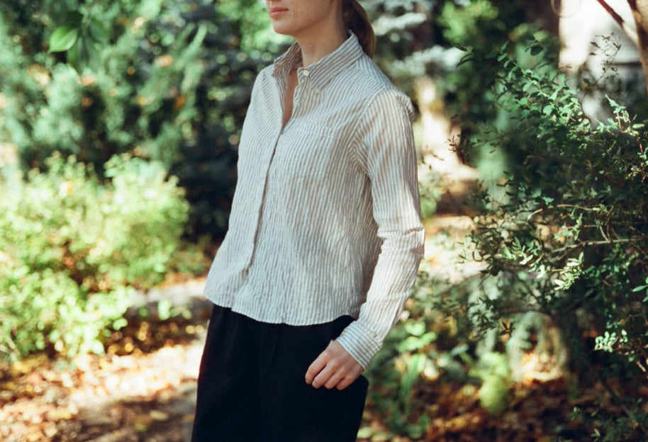 model wearing fly shirt in grey stripe