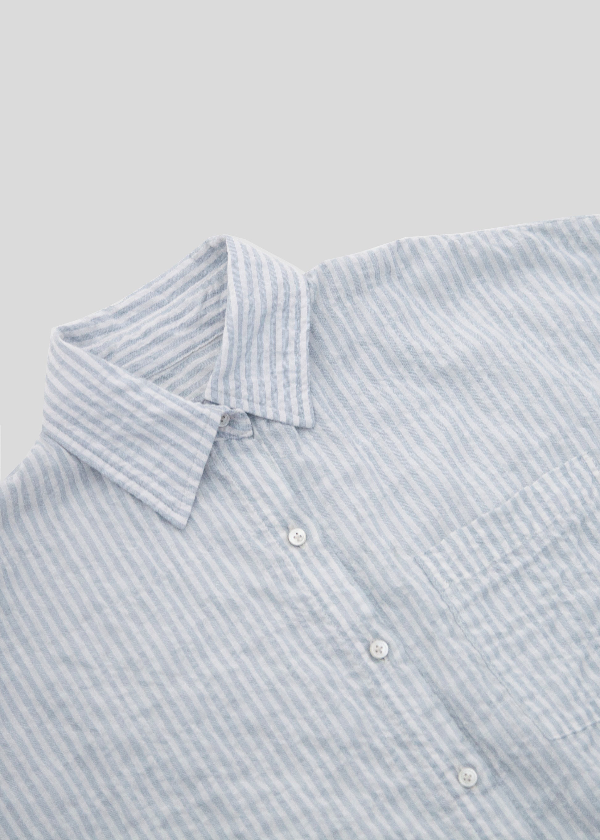 close up front flat lay of huntington shirt in color light blue stripe