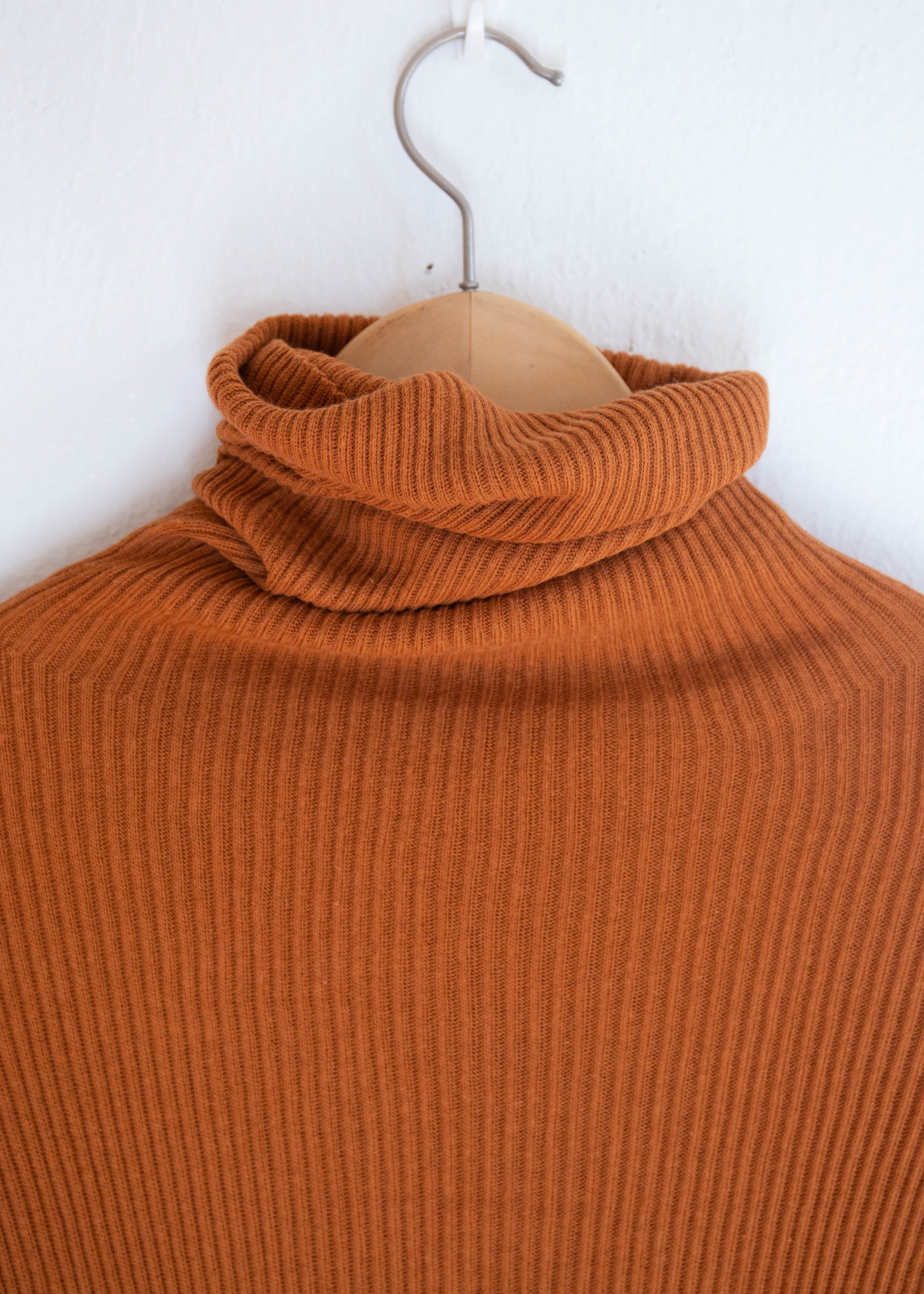 close up of turtleneck pullover in color camel