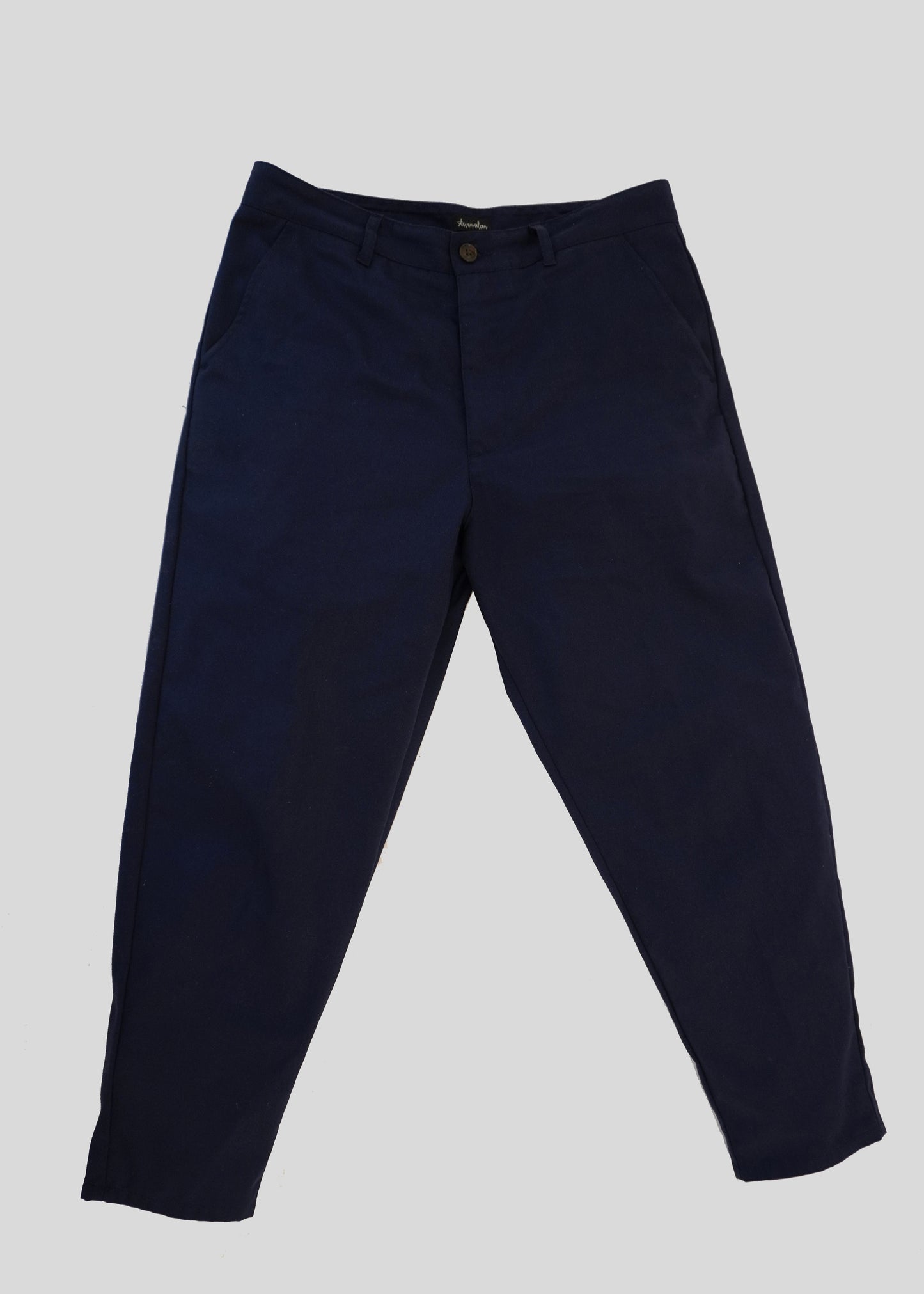 Front flat lay of lightweight danver pants in color navy