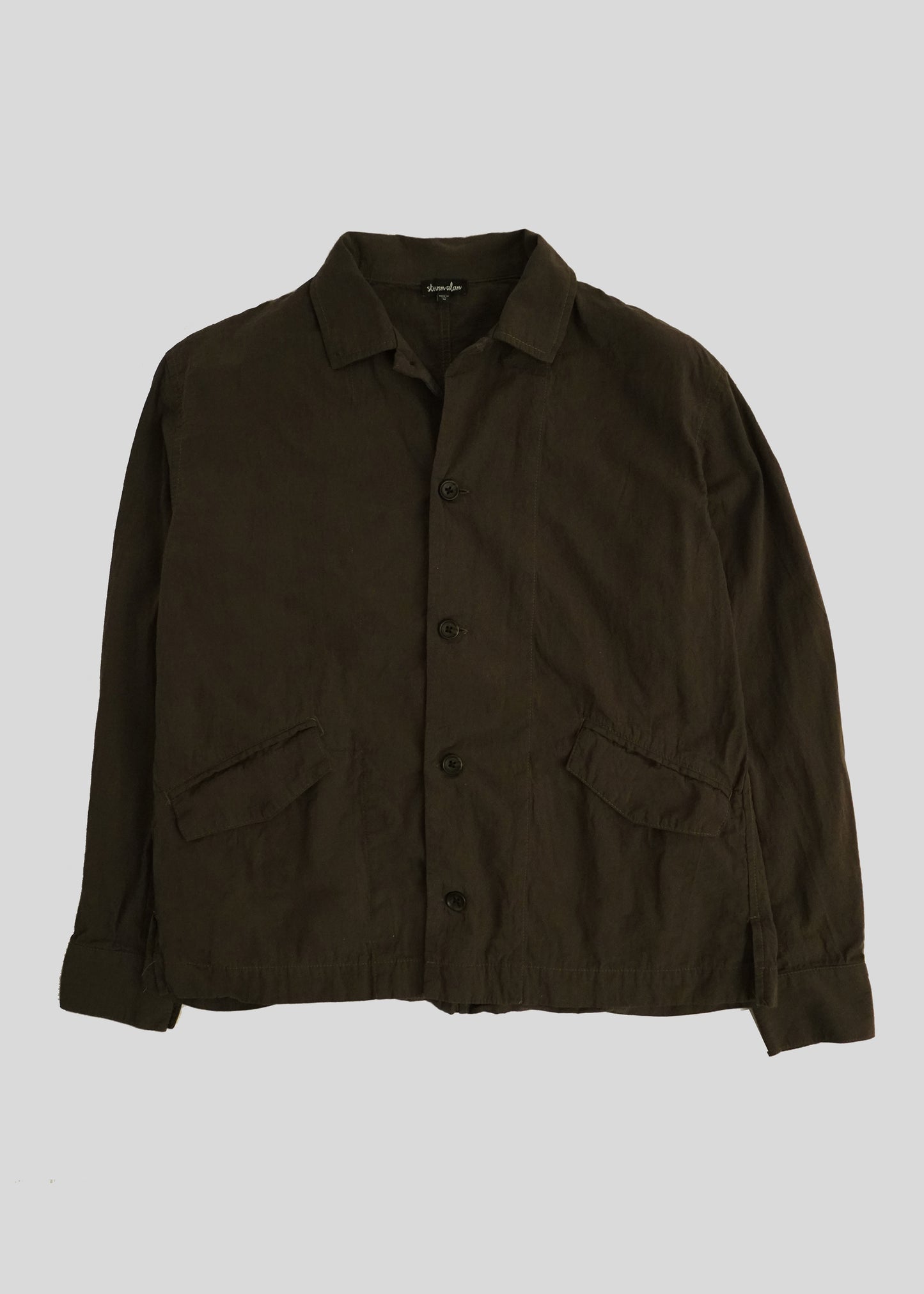 Painter Shirt in color dark green flat lay front