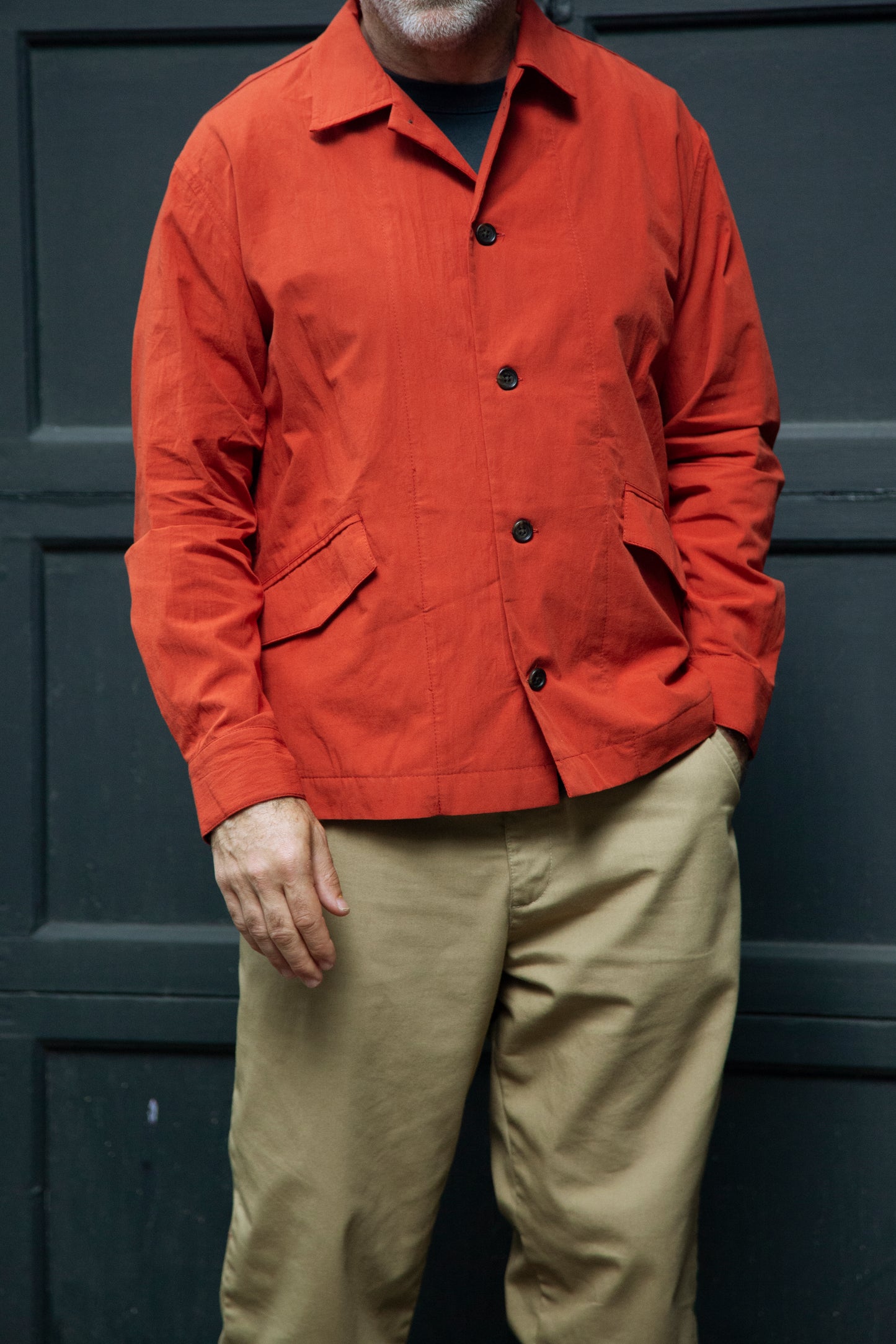 Painter Shirt color rust and khaki pants on male model
