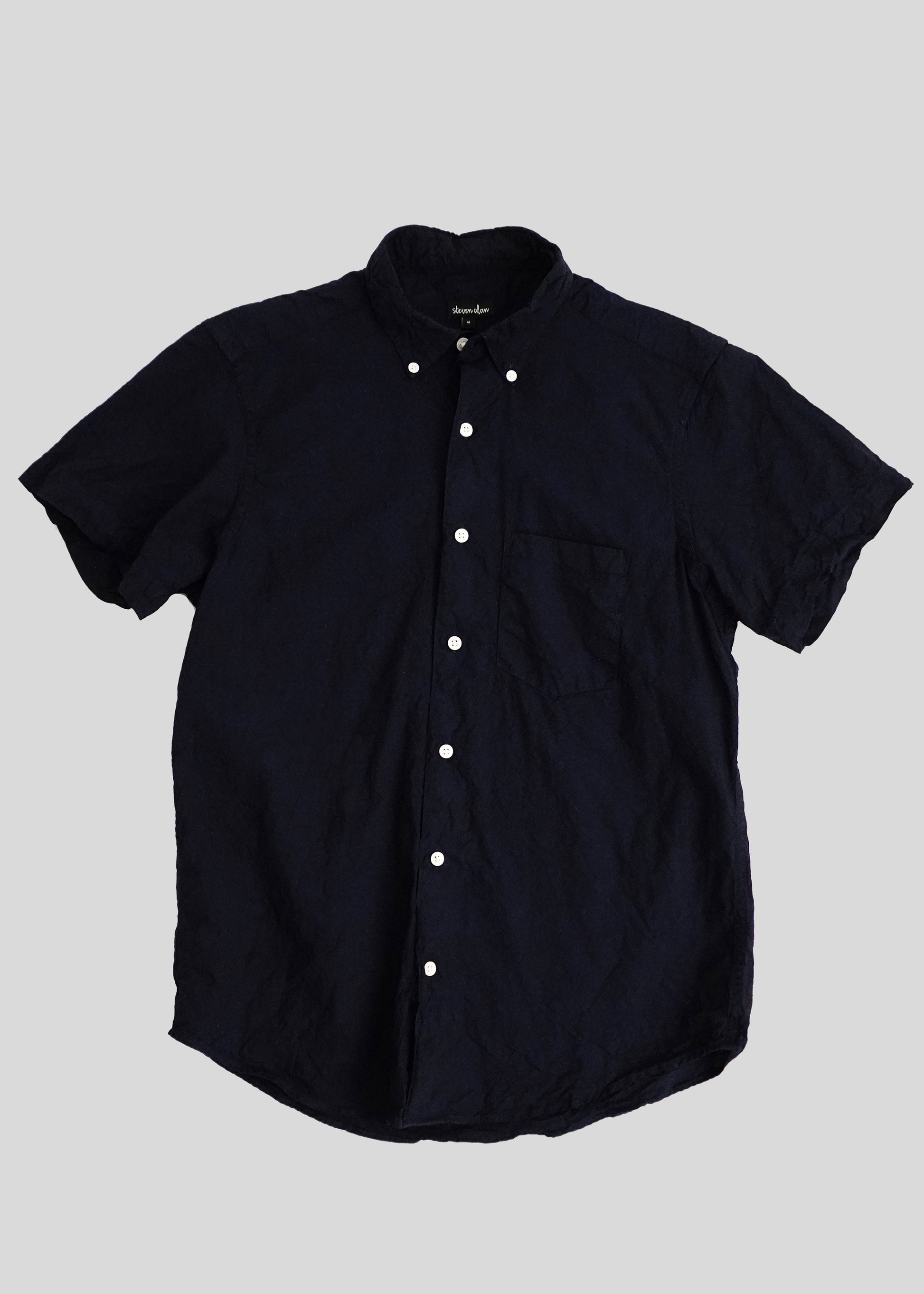 Front flat lay of short sleeve single needle shirt navy crinkle cotton 