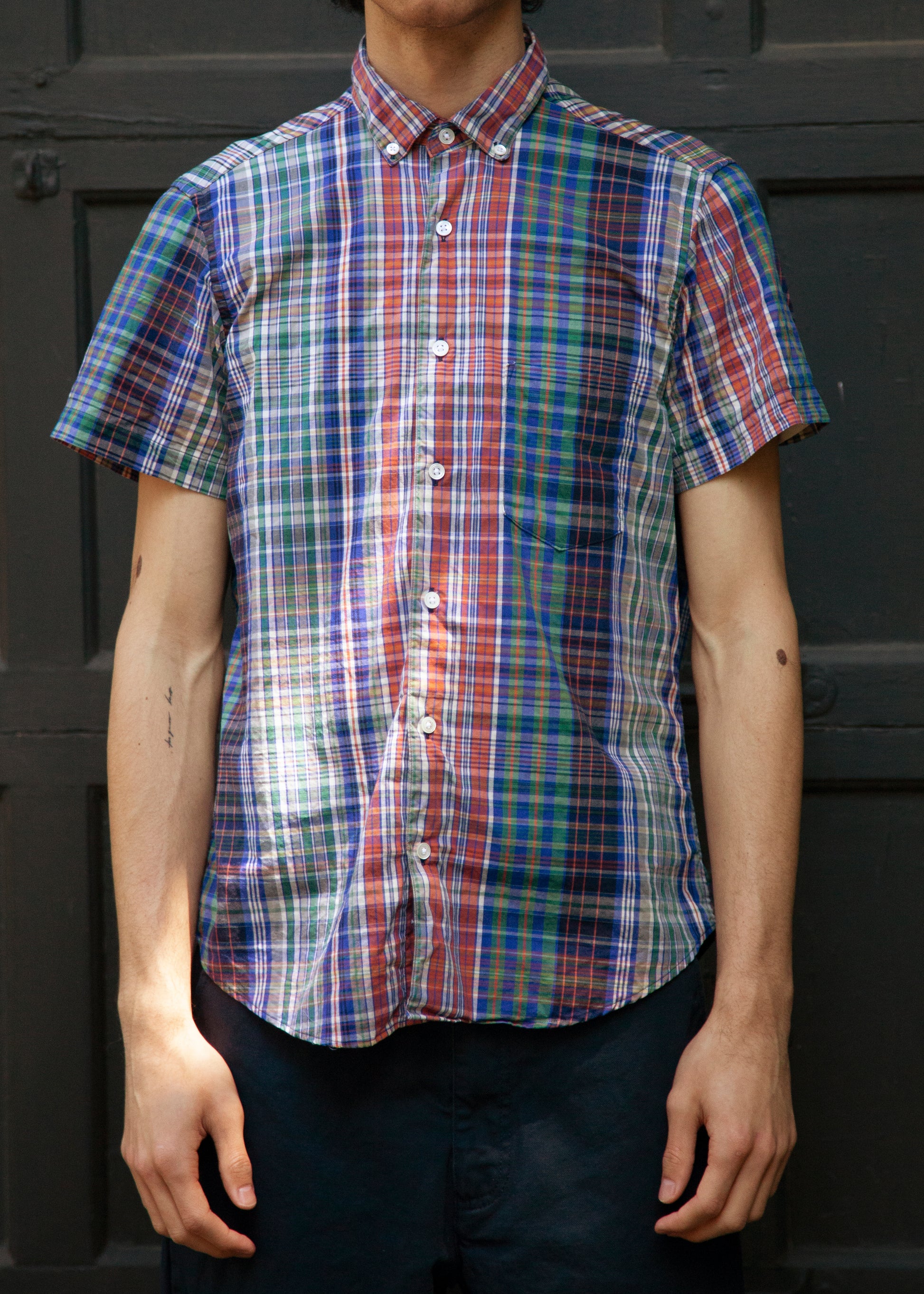 short sleeve single needle shirt red madras and black gathered pant on model front