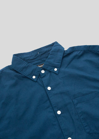 close up front flat lay of washed poplin shirt brandenburg blue