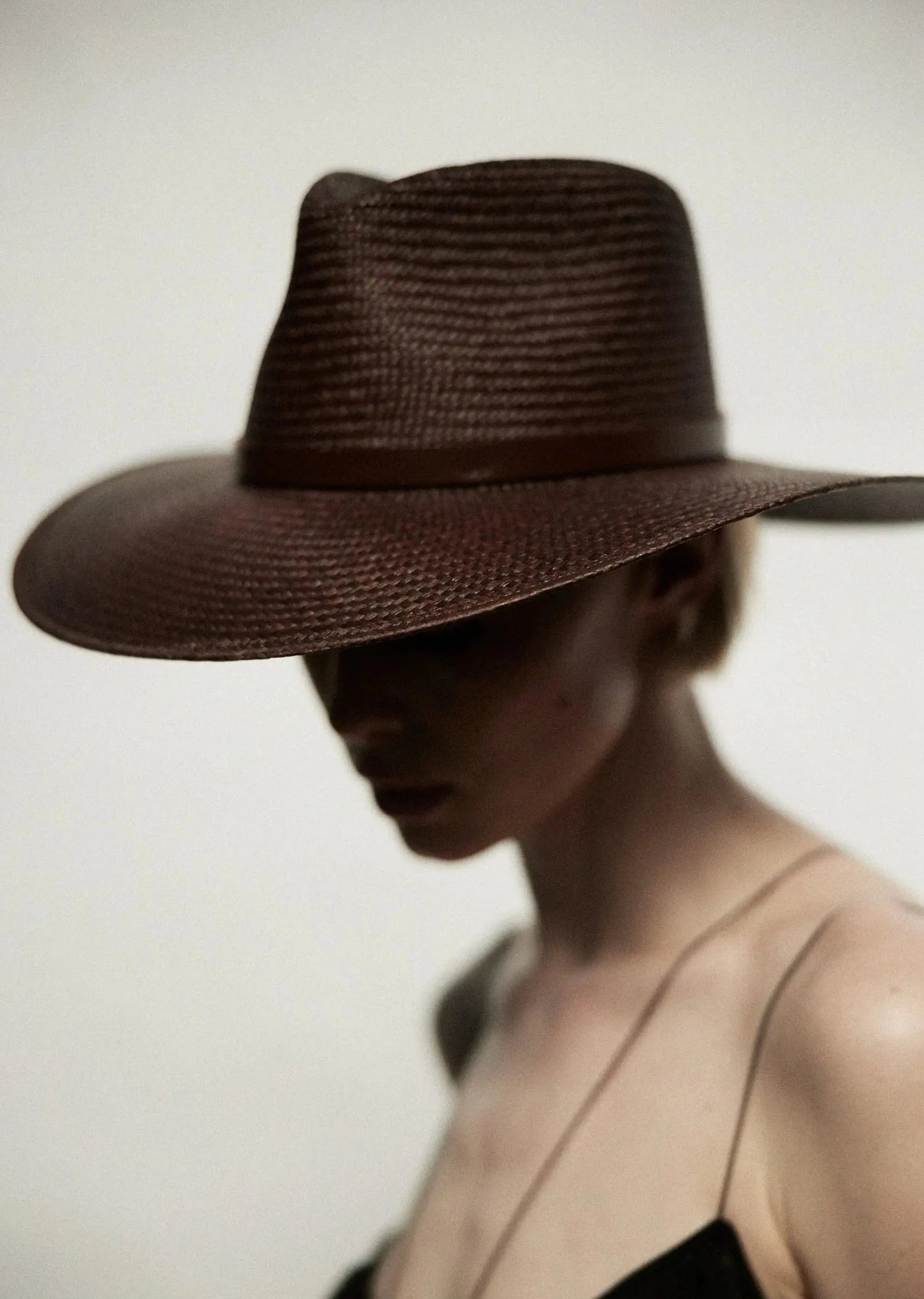Model wearing Scarlett hat in color chestnut 