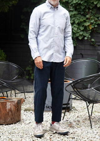 model standing up wearing single needle shirt front