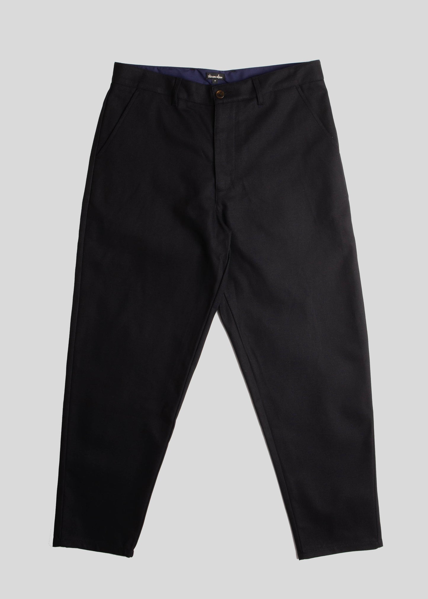 Front flat lay of long danver pant in color black