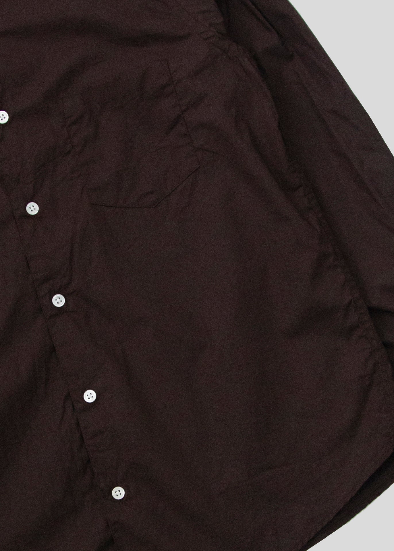 close up shot of single needle shirt in dark brown broadcloth