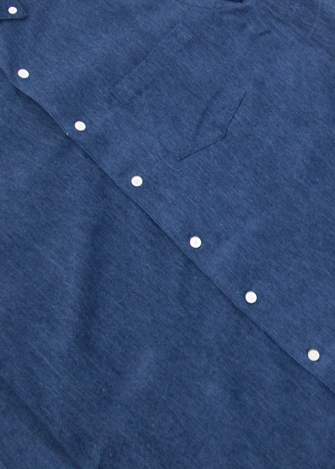 close up Flat lay front single needle shirt dark blue denim