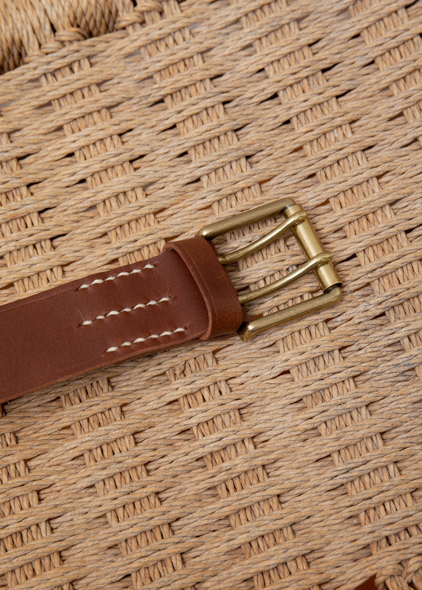 close up of details of cow leather belt in color dark brown