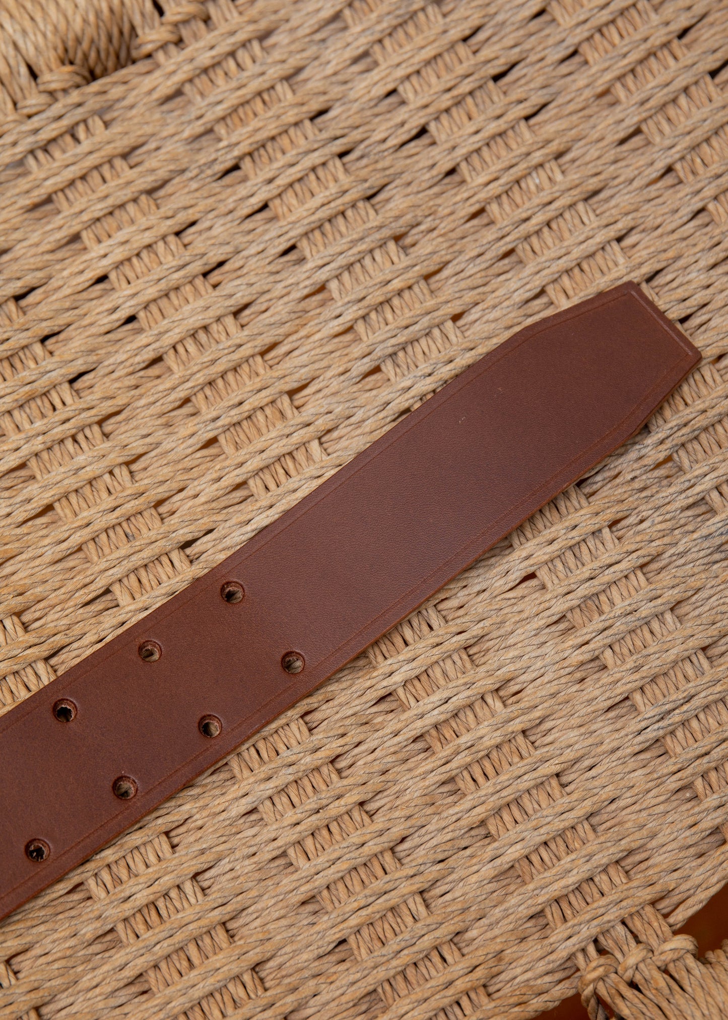 close up of cow leather belt in dark brown