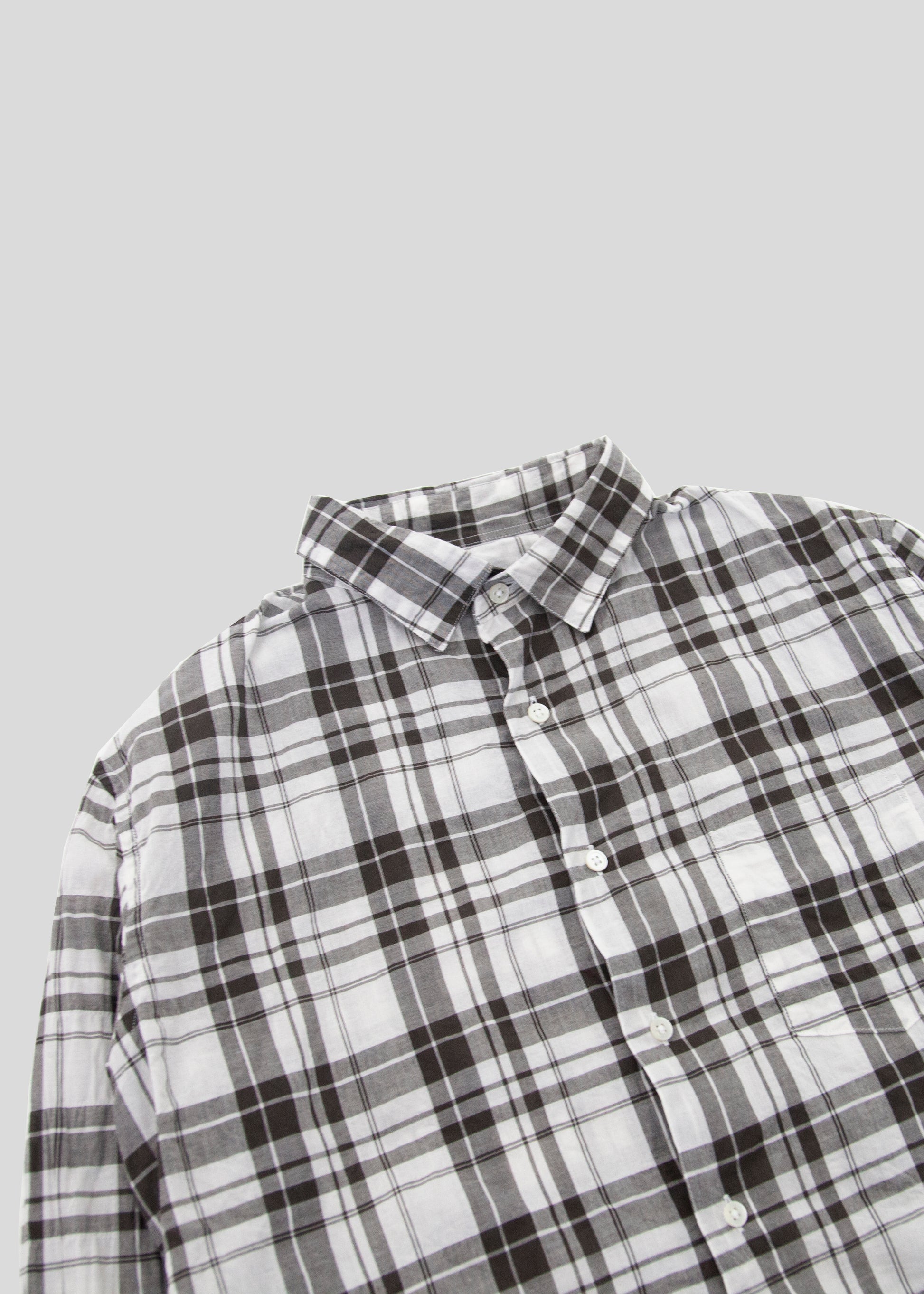 close up Front flat lay of notch shirt in color BW Check