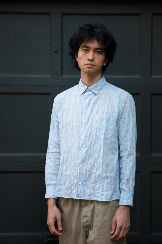  notch shirt in color light blue stripe on model  front