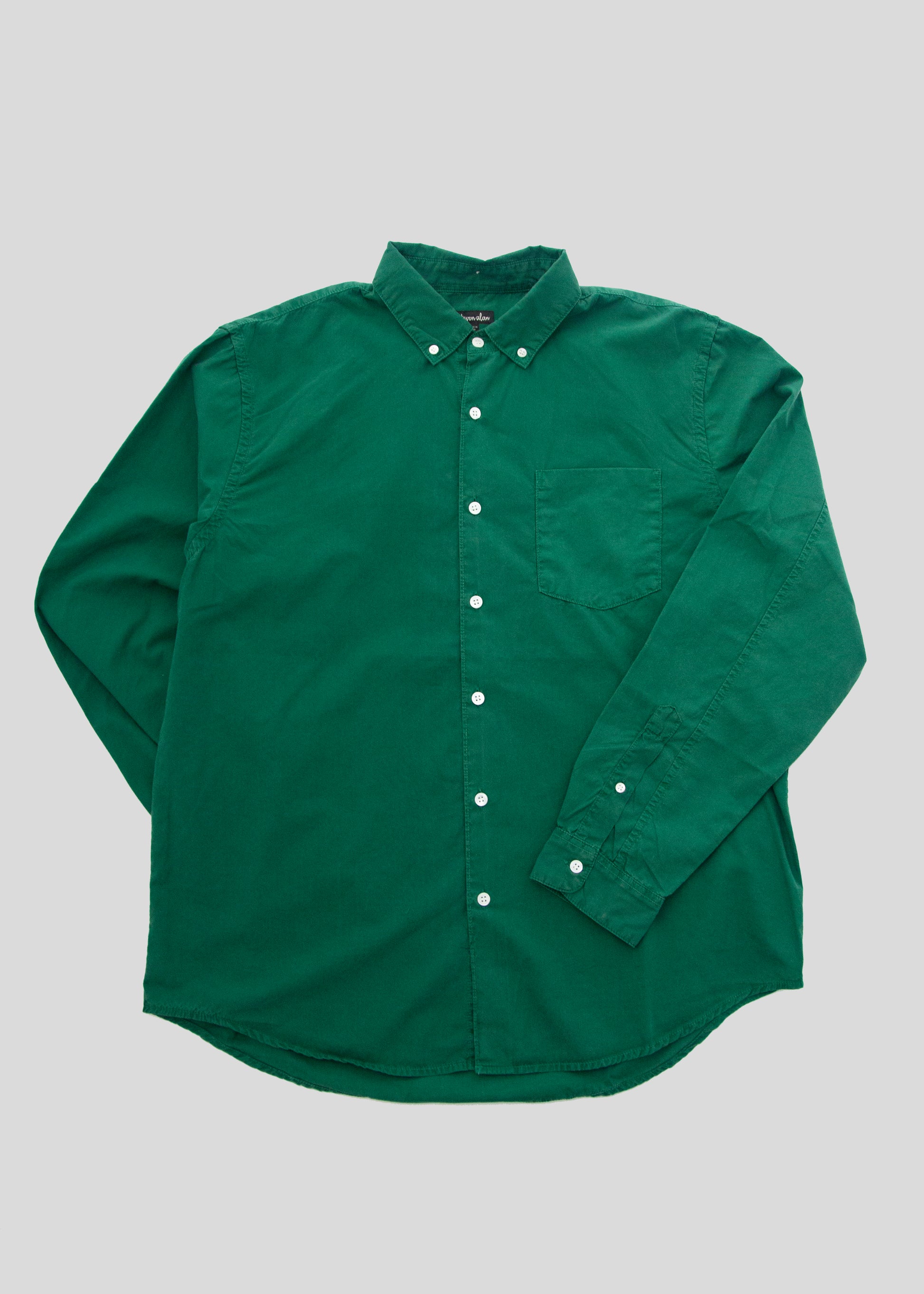 front flat lay of washed poplin shirt in color kaitoke green