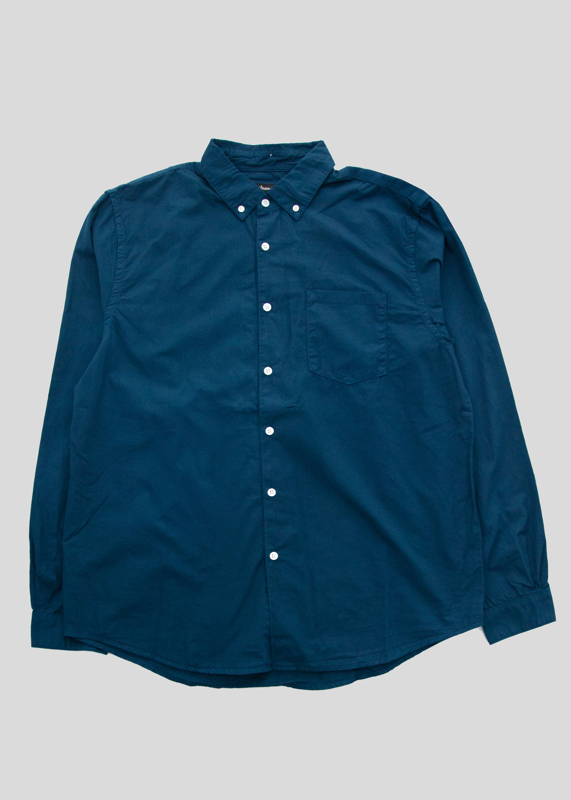 front flat lay of washed poplin shirt in brandenburg blue