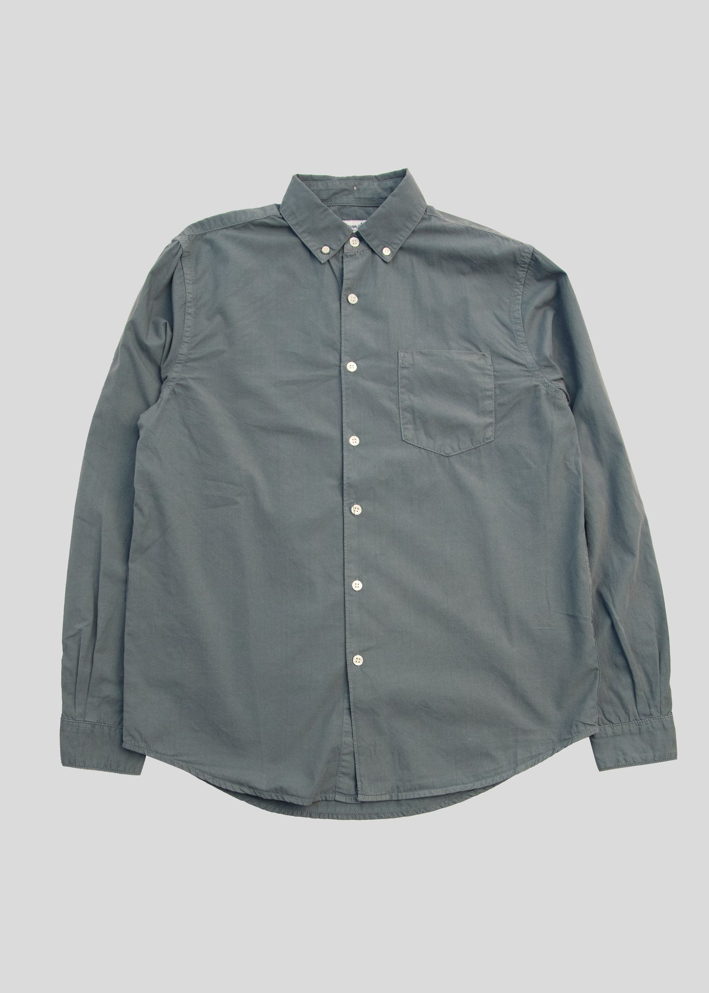 Front flat lay of washed poplin shirt in steel blue 