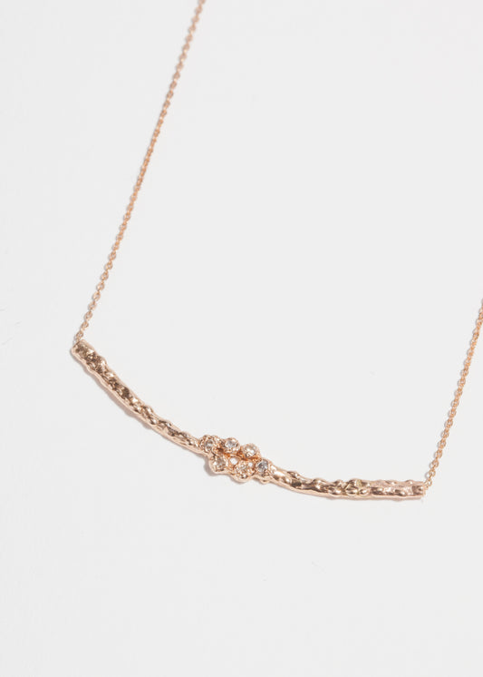 Diamond cluster necklace close up 