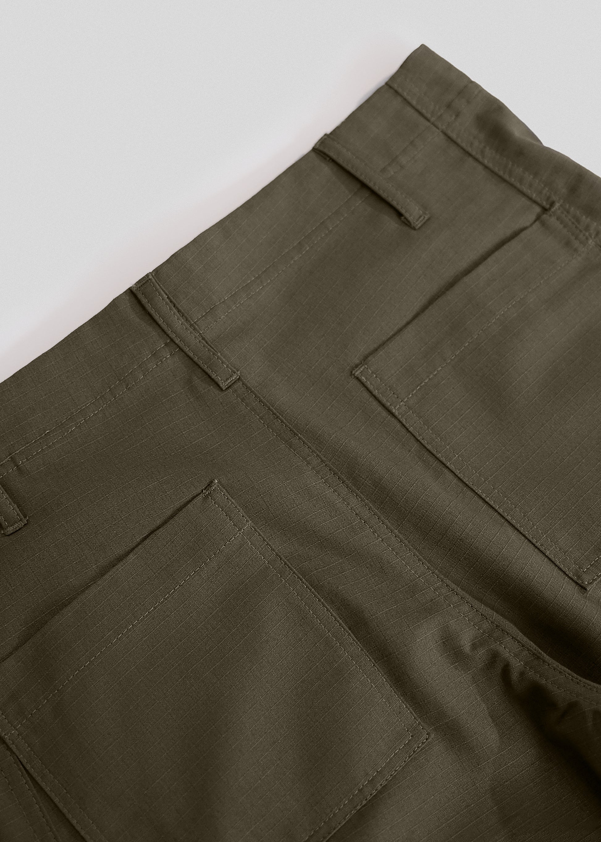 close up shot of back flat lay of slacker pants in color ranger green