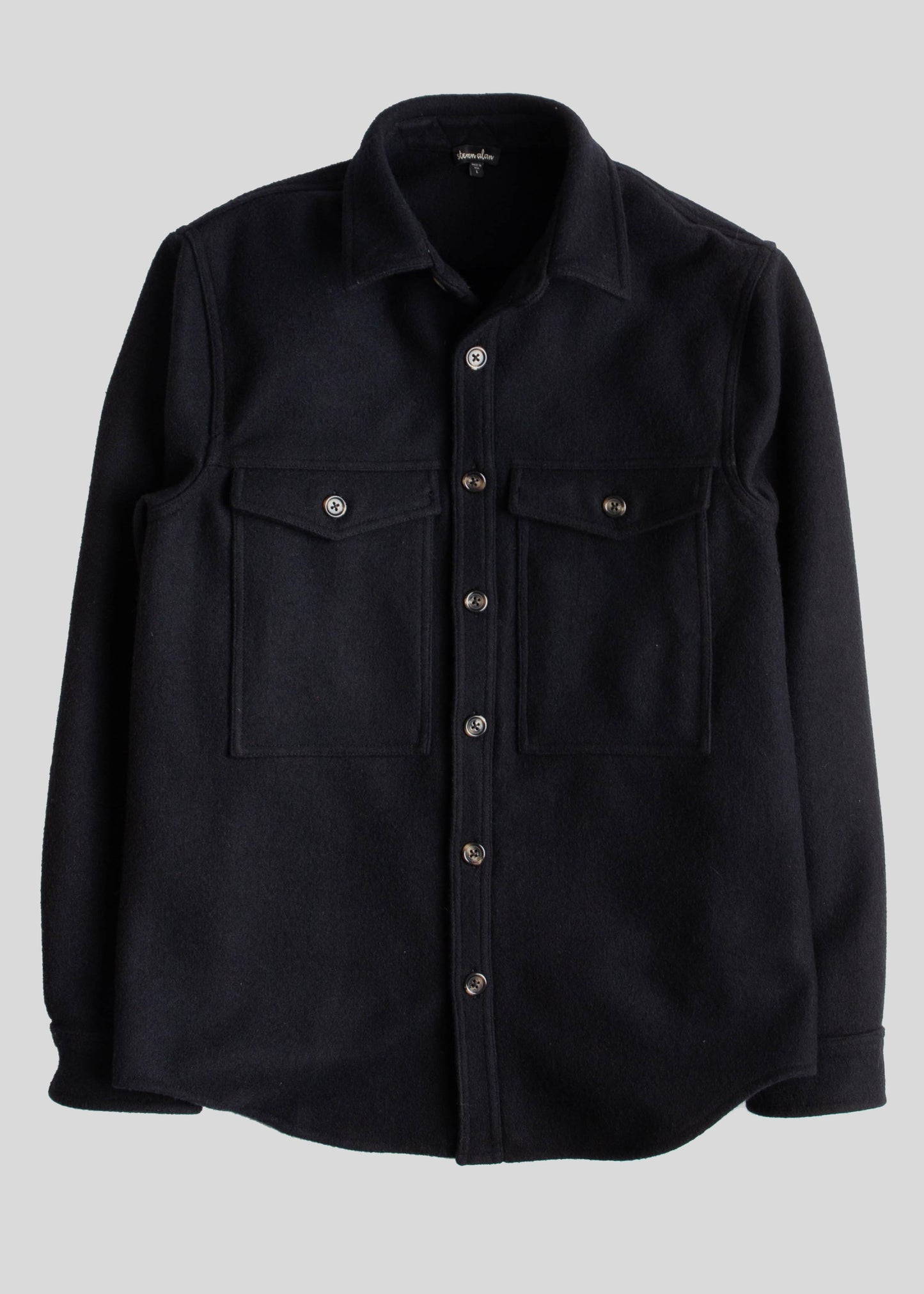 Front flat lay of black melton wool double pocket shirt