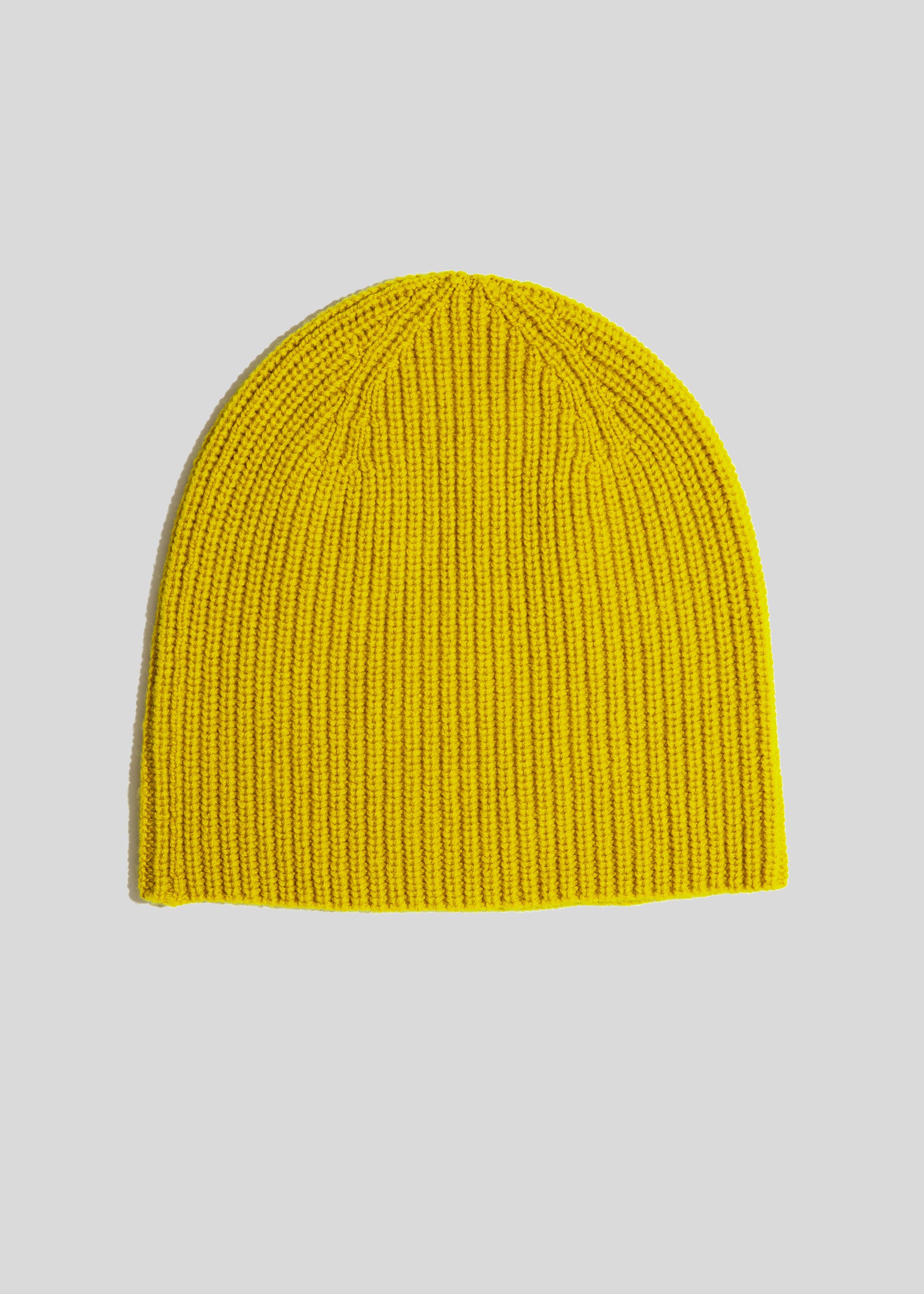 Front flat lay of beanie color tumeric